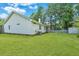 House exterior view showcasing white siding and landscaping at 8300 Berringer Bluff Dr, Charleston, SC 29418