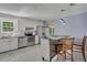 Modern kitchen with white cabinets and granite counters at 8300 Berringer Bluff Dr, Charleston, SC 29418
