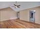 Living room with hardwood floors and vaulted ceiling, offering an open and airy feel at 8300 Berringer Bluff Dr, Charleston, SC 29418