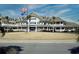 Elegant community clubhouse with landscaping and flagpoles at 1647 Live Oak Park, Seabrook Island, SC 29455