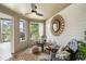 Bright sunroom with comfy seating and access to a deck at 1647 Live Oak Park, Seabrook Island, SC 29455