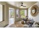 Sunroom with access to deck and comfortable seating at 1647 Live Oak Park, Seabrook Island, SC 29455