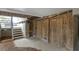 Exterior storage area with wooden doors and stairs leading to deck at 1647 Live Oak Park, Seabrook Island, SC 29455