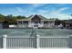 Tennis courts with a clubhouse in the background at 1647 Live Oak Park, Seabrook Island, SC 29455