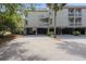 Multi-level building with covered parking and balconies at 1647 Live Oak Park, Seabrook Island, SC 29455