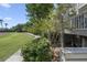 Landscaped grounds with lush greenery, a walkway, and a glimpse of the house at 1647 Live Oak Park, Seabrook Island, SC 29455