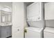 Convenient laundry closet with a stackable washer and dryer at 1647 Live Oak Park, Seabrook Island, SC 29455