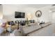 Spacious living room featuring comfortable seating and large TV at 1647 Live Oak Park, Seabrook Island, SC 29455