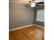 Bright bedroom with hardwood floors and ceiling fan at 4720 Glenn St, North Charleston, SC 29405