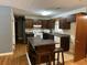 Kitchen with dark wood cabinets and an island at 4720 Glenn St, North Charleston, SC 29405