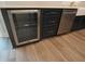Modern kitchen with wine cooler and stainless steel dishwasher at 4504 Smoak Rd, Meggett, SC 29449