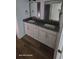Elegant bathroom with double vanity, quartz countertops, and gold fixtures at 4504 Smoak Rd, Meggett, SC 29449