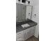 Modern bathroom with single vanity and gray quartz countertop at 4504 Smoak Rd, Meggett, SC 29449