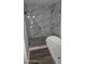 Spa-like bathroom with frameless shower and freestanding bathtub at 4504 Smoak Rd, Meggett, SC 29449