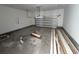 Unfinished two-car garage with high ceilings and ample storage space at 450 Ripple Park Dr, Summerville, SC 29486