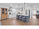 Modern kitchen with white cabinets, a large island, and stainless steel appliances at 450 Ripple Park Dr, Summerville, SC 29486