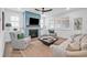 Living room with fireplace, built-ins, and a ceiling fan at 450 Ripple Park Dr, Summerville, SC 29486