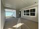Covered patio space with concrete flooring and window access at 450 Ripple Park Dr, Summerville, SC 29486