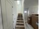 Unfinished staircase with wood framing and access to upper floor at 450 Ripple Park Dr, Summerville, SC 29486