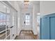 Bright and airy entryway with hardwood floors and a view to the living room at 450 Ripple Park Dr, Summerville, SC 29486