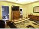 Main bedroom with a dresser, en-suite bathroom access, and a comfortable king-size bed at 113 Netherfield Dr, Summerville, SC 29486