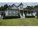 Charming two-story house with gray siding and a white porch at 86 Watershed Ct, Walterboro, SC 29488