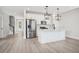 Modern kitchen with white cabinets, stainless steel appliances, and an island at 414 Queenview Ln, Charleston, SC 29414
