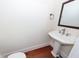 Small bathroom with pedestal sink and toilet at 687 Oak Marsh Dr, Mount Pleasant, SC 29464