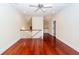 Bright bonus room with hardwood floors and a view of the staircase at 687 Oak Marsh Dr, Mount Pleasant, SC 29464