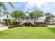 Two story home with front porch, lush landscaping and double staircase at 687 Oak Marsh Dr, Mount Pleasant, SC 29464