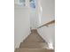 Modern staircase with light wood steps and white walls at 509 Twin Lakes Dr, Summerville, SC 29483