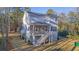 Two story home with wrap around porch, screened porch, and detached garage at 509 Twin Lakes Dr, Summerville, SC 29483