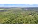 Aerial view of a secluded lot surrounded by lush green forest at 509 Twin Lakes Dr, Summerville, SC 29483