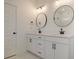 Bathroom with double vanity, large mirrors, and marble flooring at 509 Twin Lakes Dr, Summerville, SC 29483