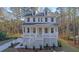 Two story house with front porch and attached garage at 509 Twin Lakes Dr, Summerville, SC 29483