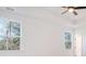 Spacious bedroom with hardwood floors, ceiling fan, and large windows at 509 Twin Lakes Dr, Summerville, SC 29483