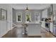 Modern kitchen with island and stainless steel appliances at 315 Ashley Ave # C, Charleston, SC 29403