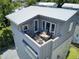 Private rooftop deck with seating and city views at 315 Ashley Ave # C, Charleston, SC 29403