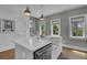 Modern kitchen with large island and stainless steel appliances at 315 Ashley Ave # C, Charleston, SC 29403