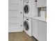 Stackable washer and dryer in a small laundry room at 315 Ashley Ave # C, Charleston, SC 29403