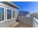 Private deck with wood flooring and neighborhood views at 315 Ashley Ave # C, Charleston, SC 29403