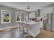 Modern kitchen with island and stainless steel appliances at 315 Ashley Ave # C, Charleston, SC 29403