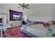 Charming bedroom featuring a comfy bed, work area, and purple tapestry at 315 Ashley Ave # C, Charleston, SC 29403