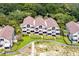 Row of condos near the beach with a shared walkway at 1394/96 Pelican Watch Villas, Seabrook Island, SC 29455
