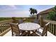 Deck with wooden table and chairs overlooking marsh at 1394/96 Pelican Watch Villas, Seabrook Island, SC 29455