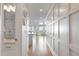 Long hallway with wood floors and access to kitchen and ocean views at 1394/96 Pelican Watch Villas, Seabrook Island, SC 29455