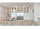 Updated kitchen boasts stainless steel refrigerator and granite island at 1394/96 Pelican Watch Villas, Seabrook Island, SC 29455