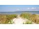 Sandy path to beach with native grasses at 1394/96 Pelican Watch Villas, Seabrook Island, SC 29455