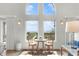 Ocean-view dining area with small table and chairs at 1394/96 Pelican Watch Villas, Seabrook Island, SC 29455