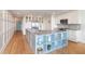 Modern kitchen with blue island and white cabinetry at 1394/96 Pelican Watch Villas, Seabrook Island, SC 29455